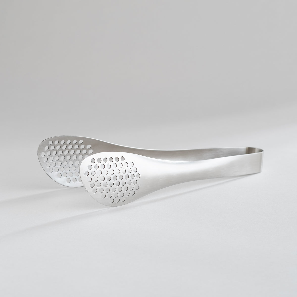 Sori Yanagi tongs, perforated